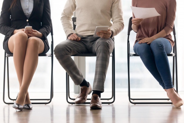 group-people-waiting-job-interview-sitting-chairs_1163-4228